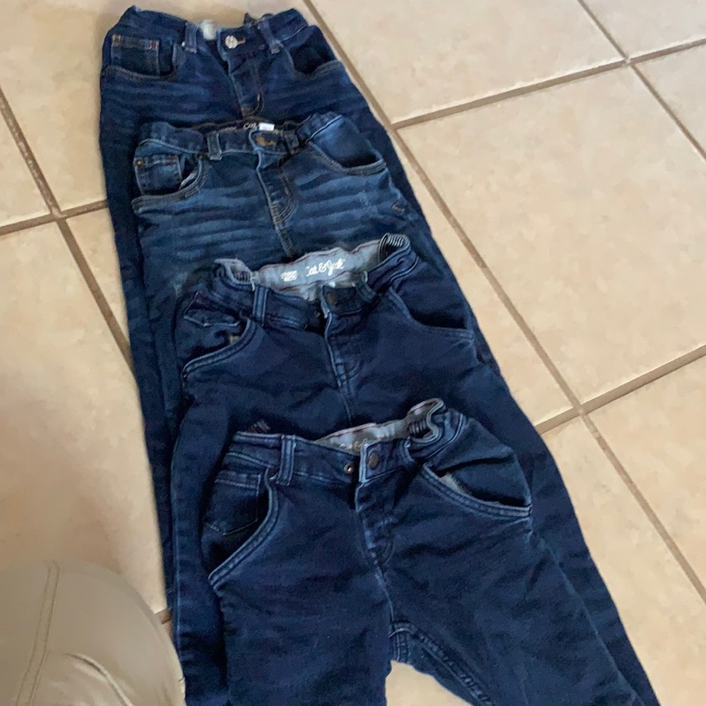 Lot of 4 boys dark denim jeans.